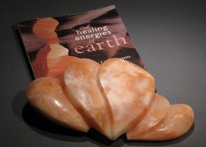 Orange heart shaped alabaster containers carved in hand gathered stone from Bryce Canyon, Utah and lined with high desert juniper.