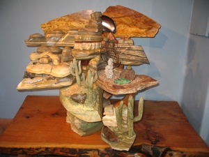 Sculpture of the geologic history of Arizona carved in Alabaster, gemstone, wood, and fossil