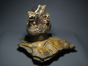 Sculpture of the geologic history of Arizona carved in Alabaster, gemstone, wood, and fossil