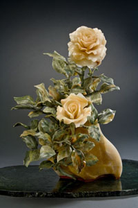 The Golden Pink Sunset Rose is an Alabaster stone sculpture by Susan Zalkind